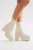 Baylor Platform Booties - Cream sold by Fashion Nova