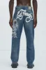 Ed Hardy Skull Baggy Jeans - Vintage Blue Wash sold by Fashion Nova