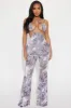 Sticking Around Jumpsuit  - Purple/combo sold by Fashion Nova
