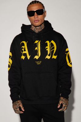 Official Saint Hoodie - Black sold by Fashion Nova