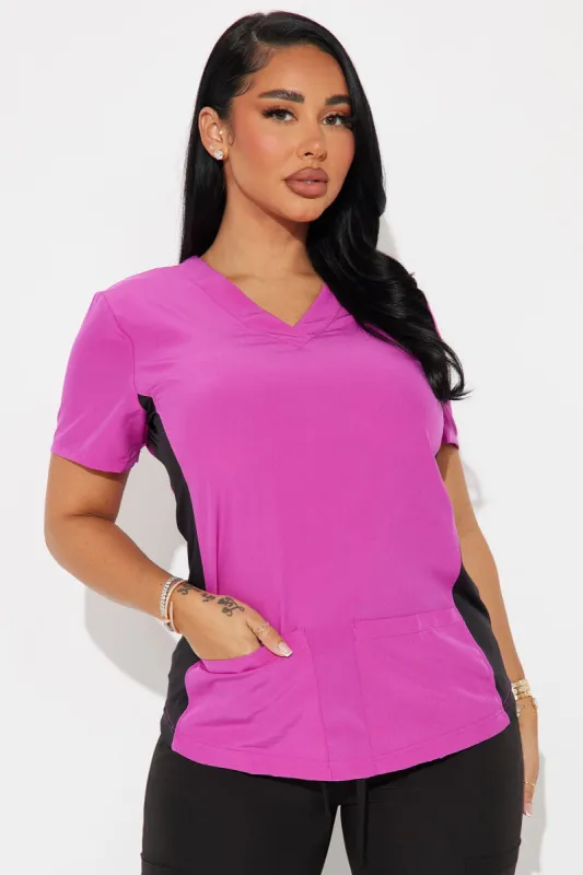 Checking In 4FLEX Uniform Scrub Top - Magenta sold by Fashion Nova