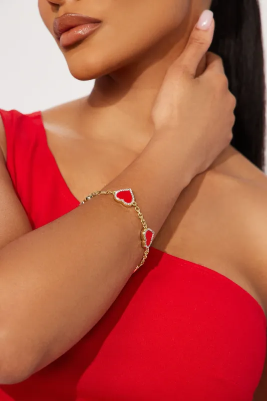 Love So Strong Bracelet - Gold/Red made by Fashion Nova