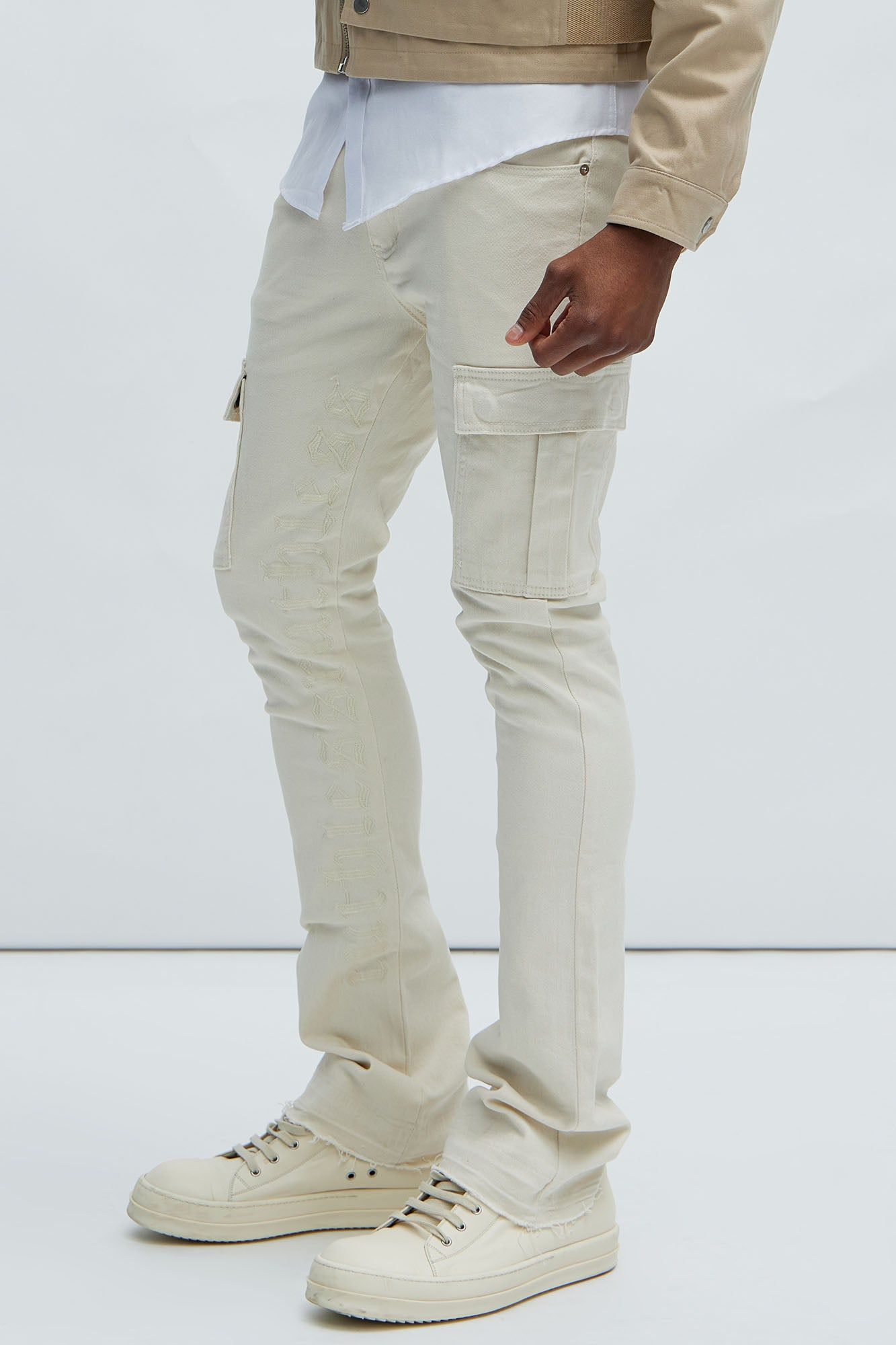 Ruthless Embroidered Stacked Skinny Cargo Flare Jeans - Off White sold by Fashion Nova