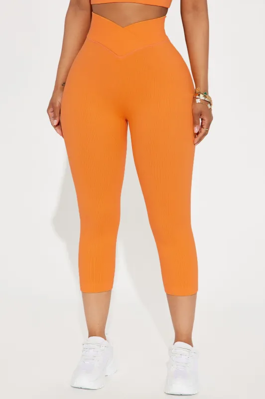 Double Cross Effortless Seamless Active Capri - Tangerine sold by Fashion Nova