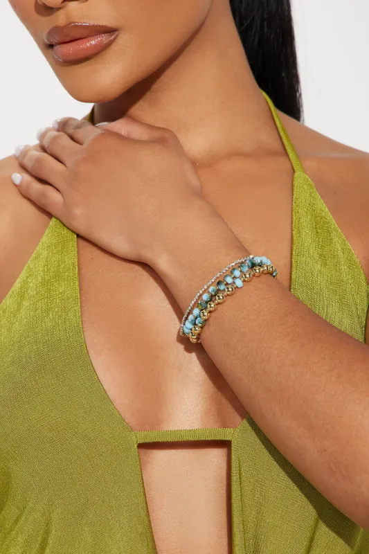 Blutopia 3 Piece Bracelet Set - Blue/Gold sold by Fashion Nova