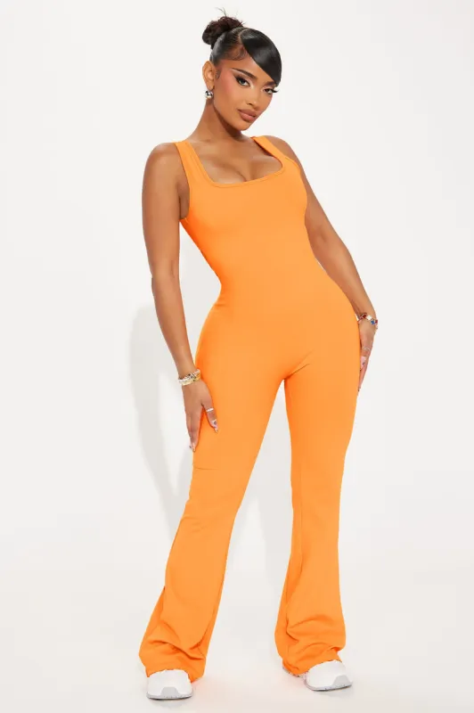 Body Burn Super Soft Active Jumpsuit - Tangerine sold by Fashion Nova