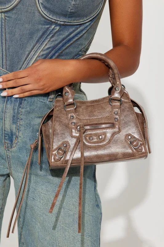 Coolest Girl On The Block Handbag  - Bronze sold by Fashion Nova