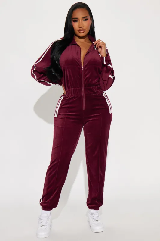 Track Star Velour Jumpsuit - Wine sold by Fashion Nova