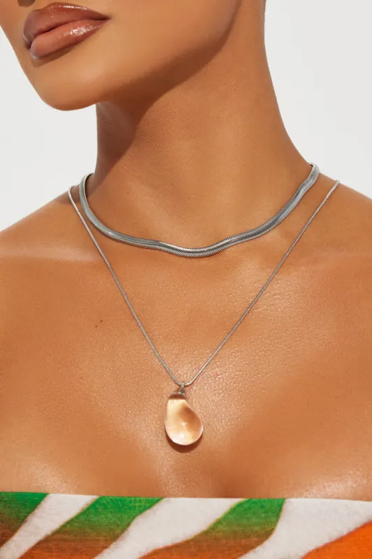 Saint Lucia Necklace - Clear/Silver sold by Fashion Nova