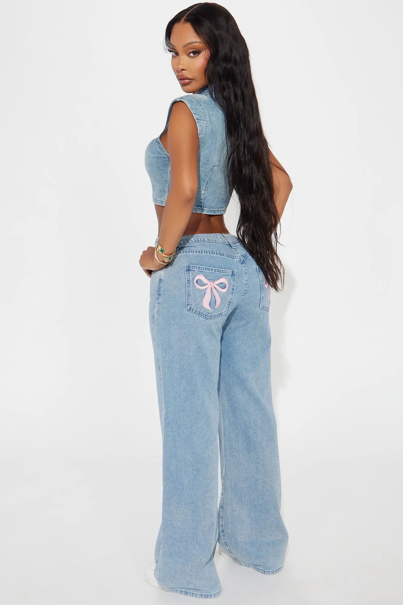 Taking A Bow Embroidered Baggy Jeans - Light Wash sold by Fashion Nova