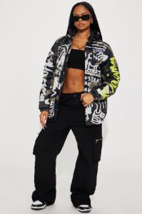 Keith Haring Camo Zip Front Jacket - Camouflage sold by Fashion Nova