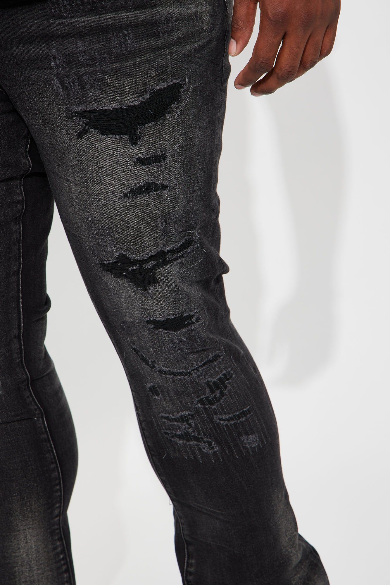 We Out Distressed Stacked Skinny Flare Jeans - Black Wash sold by Fashion Nova product image thumbnail 3