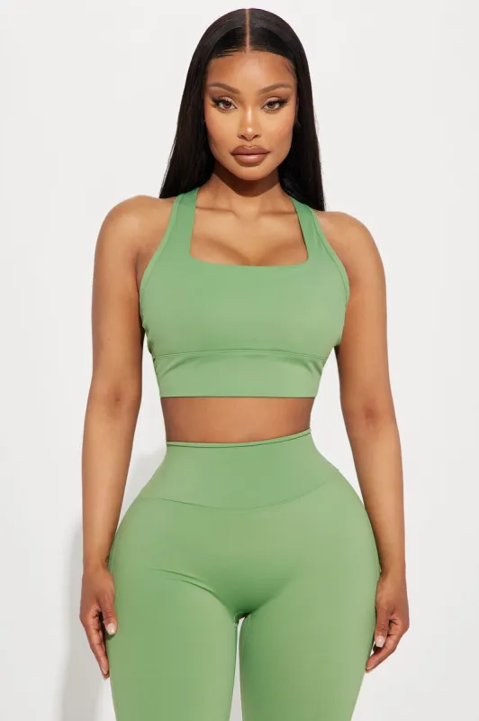 Stay Balanced Sports Bra - Sage sold by Fashion Nova