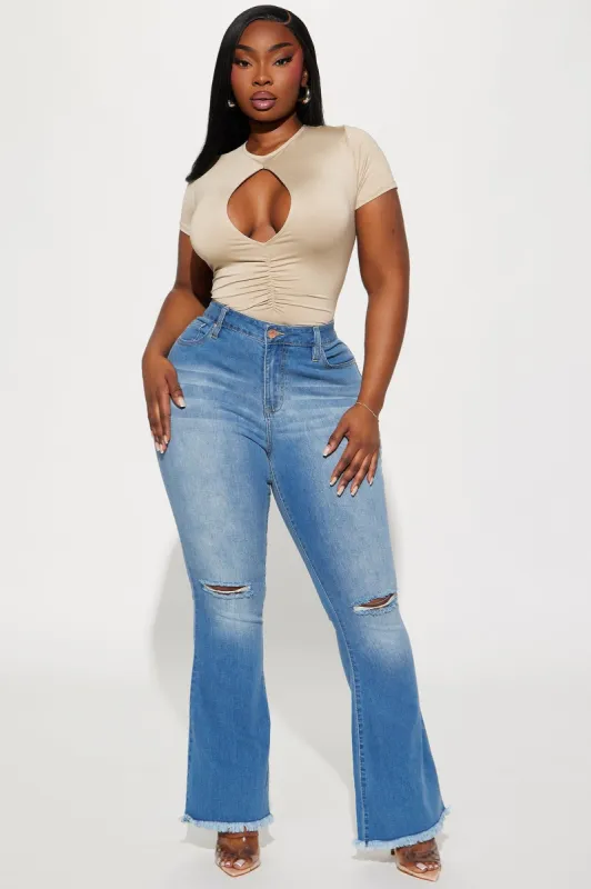 Stealing The Show Stretch Flare Jeans - Medium Wash sold by Fashion Nova