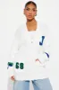 Book Smart Cardigan - Ivory/combo sold by Fashion Nova