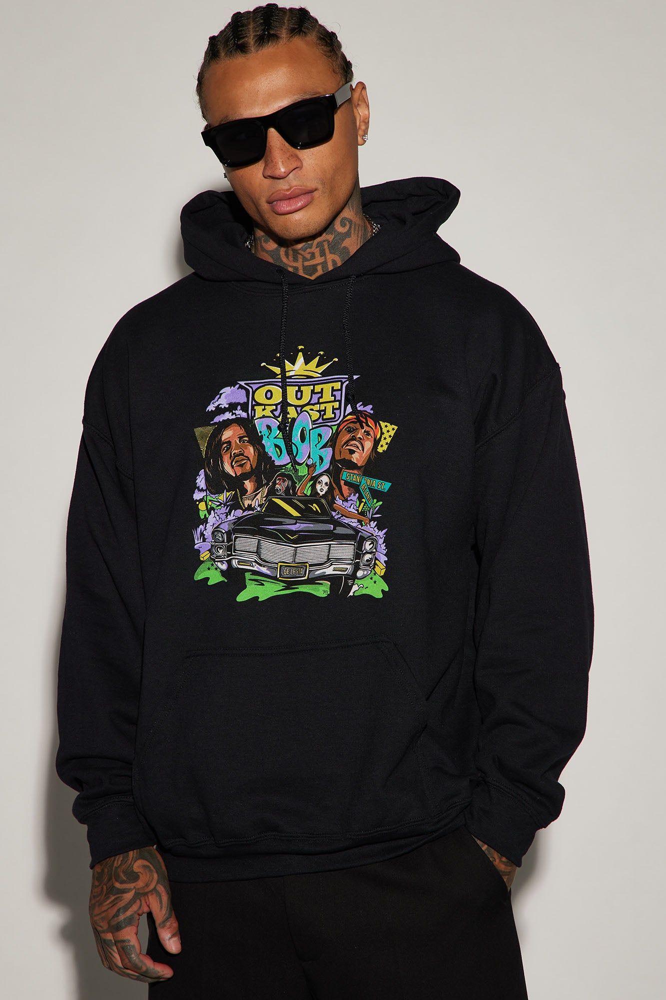 Outkast Cartoon Car Graphic Hoodie - Black sold by Fashion Nova