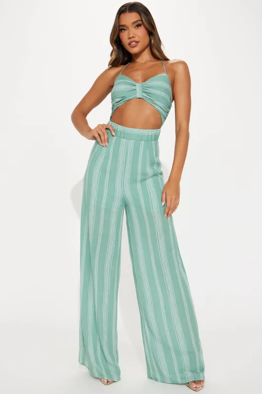 Chasing Islands Jumpsuit - Green sold by Fashion Nova