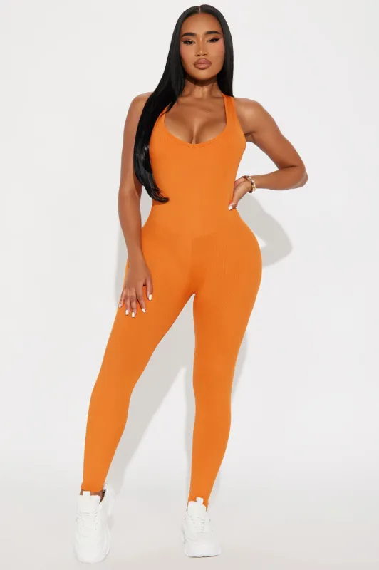 Serenity Ribbed Jumpsuit - Orange sold by Fashion Nova