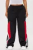 Mark Your Winnings Windbreaker Track Pant - Black/Red sold by Fashion Nova