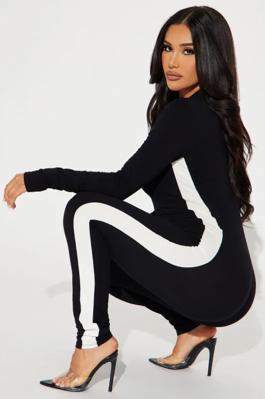 Still Your Best Jumpsuit - Black sold by Fashion Nova