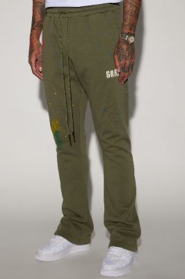 Tyson Paint Splatter Flared Sweatpant - Olive sold by Fashion Nova