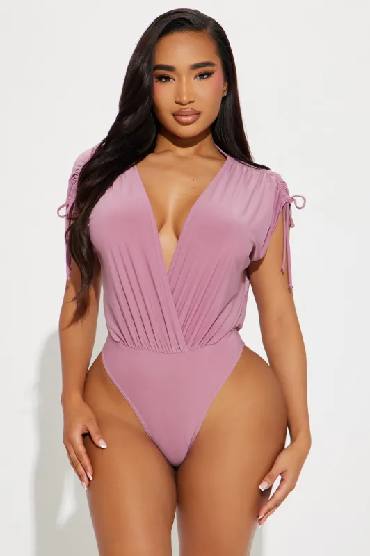 Kathryn Deep V-Neck Bodysuit - Mauve sold by Fashion Nova