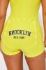 Brooklyn NY PJ Romper Onesie - Yellow sold by Fashion Nova