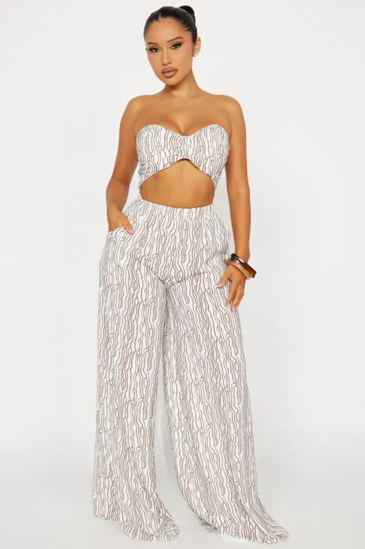 Sun Till Shine Jumpsuit - Brown sold by Fashion Nova
