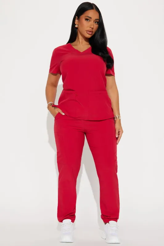 On Call Jogger Stretch Uniform Scrub Set - Red sold by Fashion Nova