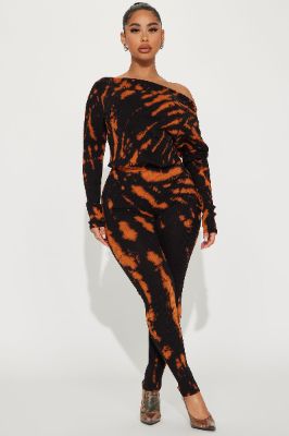 Very Cozy Tie Dye Jumpsuit  - Black/Orange sold by Fashion Nova