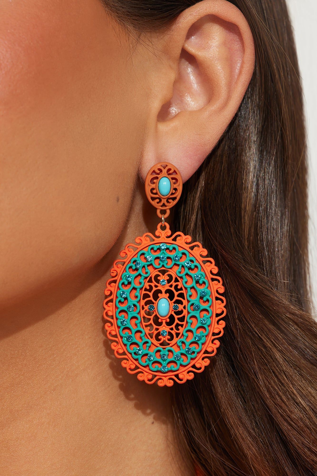 Makes You Wonder Earrings - Orange/combo sold by Fashion Nova