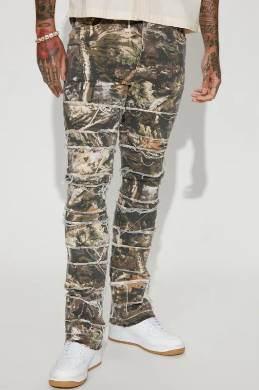 Cover Me Fray Stacked Skinny Flare Pants - Camouflage sold by Fashion Nova