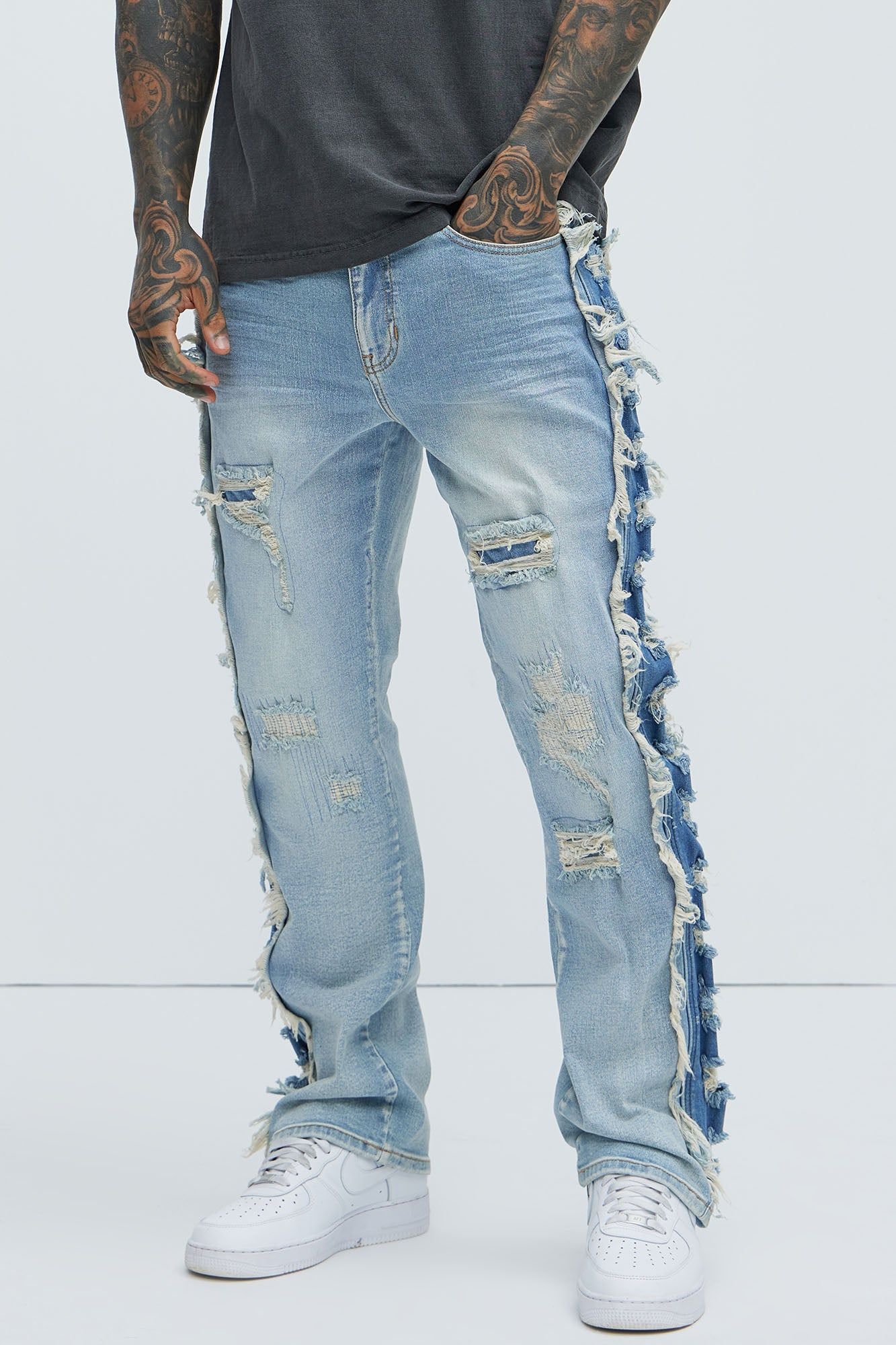 Track Stacked Skinny Flare Jeans - Medium Blue Wash sold by Fashion Nova