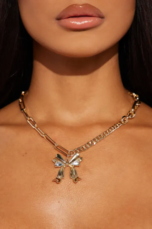 Put A Bow On It Necklace  - Gold sold by Fashion Nova