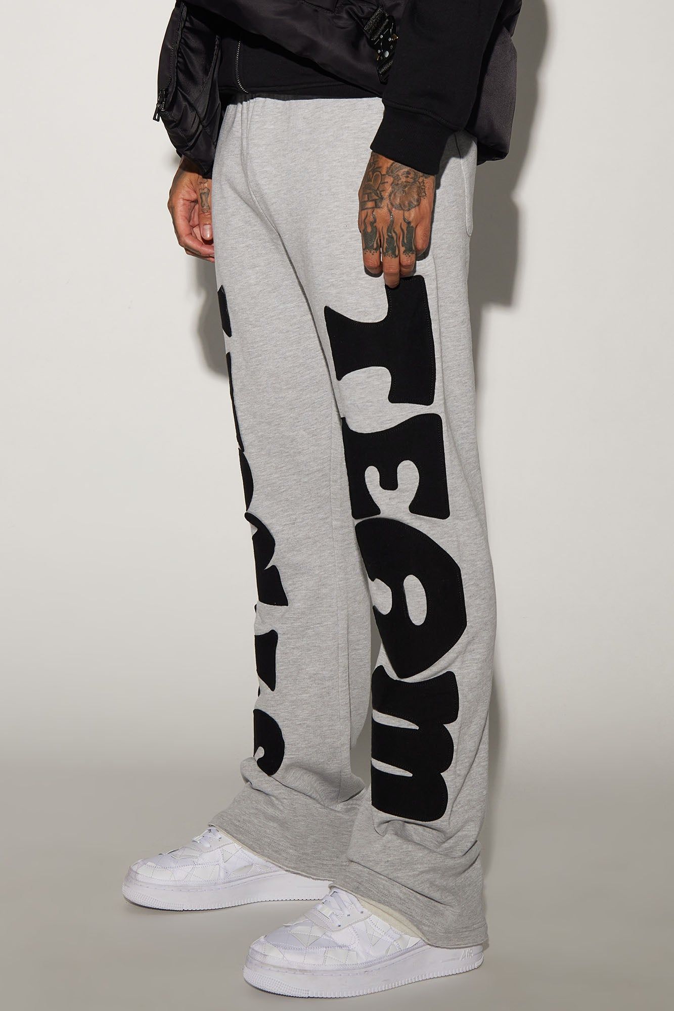 Tyson Street Team Skinny Flared Sweatpant - Heather Grey sold by Fashion Nova