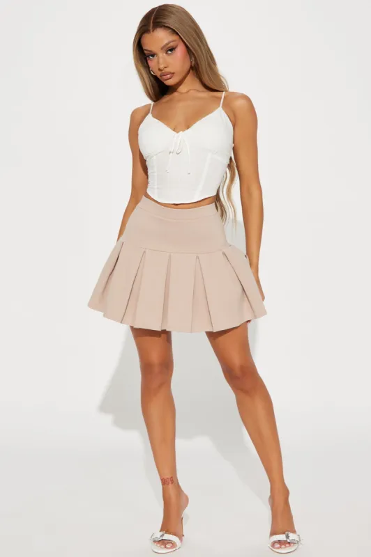 When Good Meets Bad Pleated Mini Skort - Khaki sold by Fashion Nova