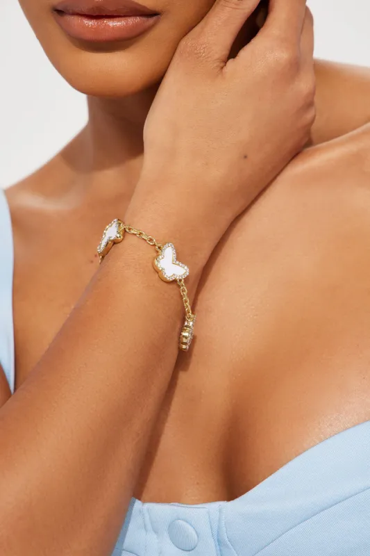 Always Looking Fly Butterfly Bracelet - White/Gold made by Fashion Nova