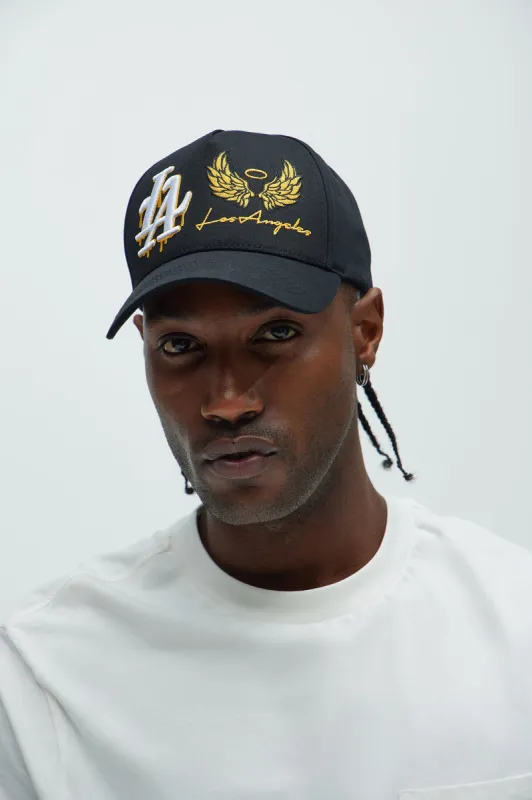La Gold Wings Snapback Hat - Black sold by Fashion Nova