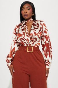Extra Passion Jumpsuit - Rust/combo sold by Fashion Nova