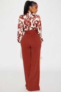 Extra Passion Jumpsuit - Rust/combo sold by Fashion Nova