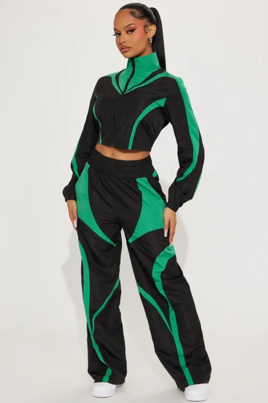 Watch Me Windbreaker Pant Set - Black/Green sold by Fashion Nova