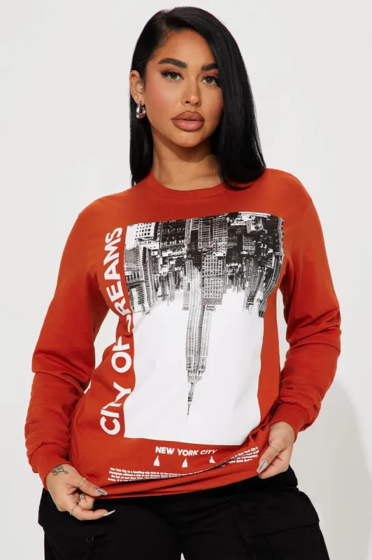 City of Dreams Long Sleeve Tee - Rust sold by Fashion Nova