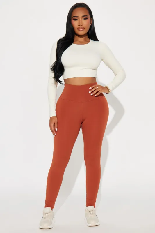 The Best Stretch Active Legging - Brown sold by Fashion Nova
