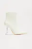 Ronan Booties - Ivory sold by Fashion Nova