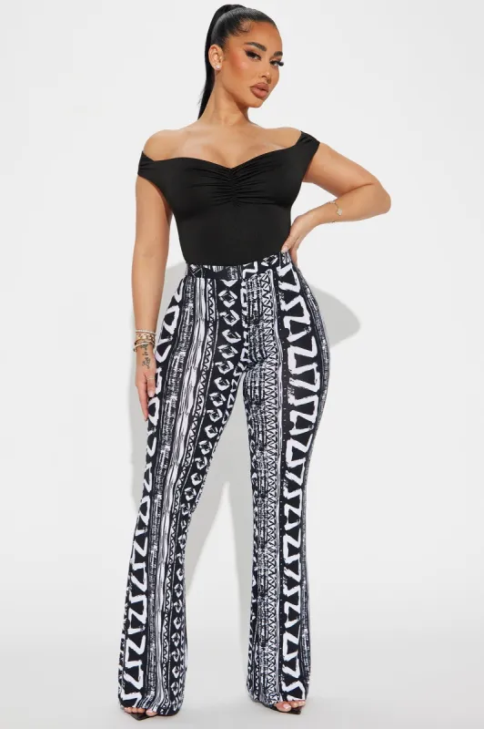 Adria Flare Pant - Black/White sold by Fashion Nova