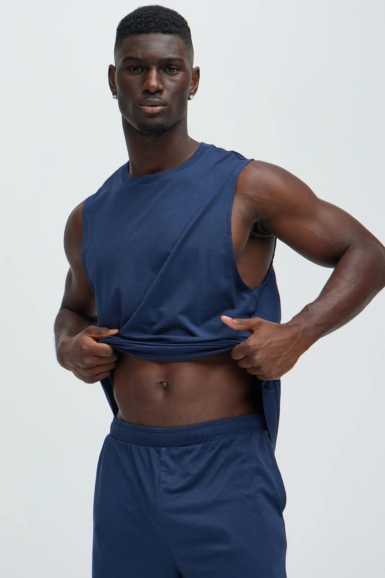Essential Lounge Sleeveless Muscle Tee - Navy sold by Fashion Nova