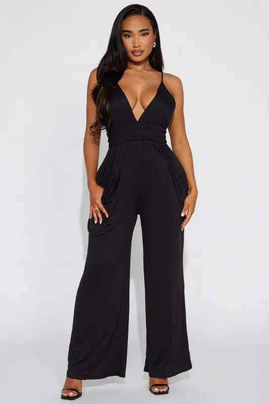 Lounge With Us Jumpsuit  - Black sold by Fashion Nova