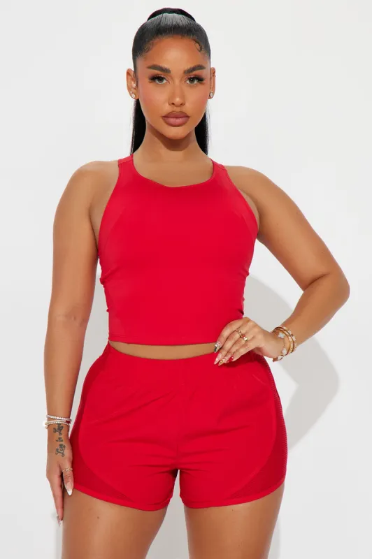Track It Elevate Active Top - Red sold by Fashion Nova