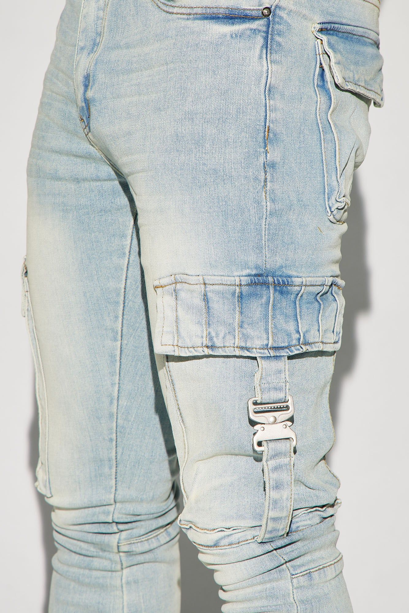 Got Me Buckled Up Stacked Skinny Flare Cargo Jeans - Light Wash sold by Fashion Nova product image thumbnail 4