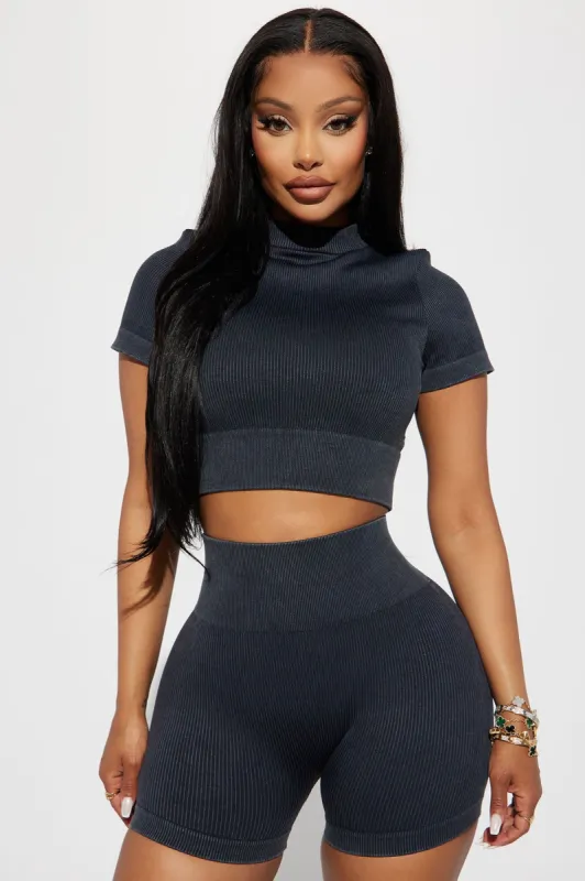 Leslie Washed Active Top - Black sold by Fashion Nova